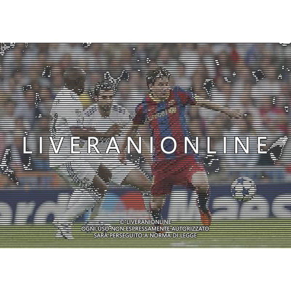 Real Madrid\'s Raul Albiol and Barcelona\'s Lionel Messi during Champions League semifinal first match on April 27 2011. Photo: Alex Cid-Fuentes / ALFAQUI AG ALDO LIVERANI ONLY ITALY