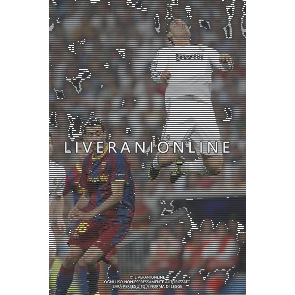 Real Madrid\'s Cristiano Ronaldo and Barcelona\'s Sergio Busquets during Champions League semifinal first match on April 27 2011. Photo: Alex Cid-Fuentes / ALFAQUI AG ALDO LIVERANI ONLY ITALY