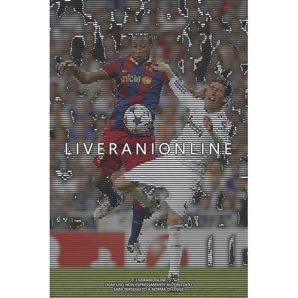 Real Madrid\'s Sergio Ramos and Barcelona\'s Seydou Keita during Champions League semifinal first match on April 27 2011. Photo: Alex Cid-Fuentes / ALFAQUI AG ALDO LIVERANI ONLY ITALY