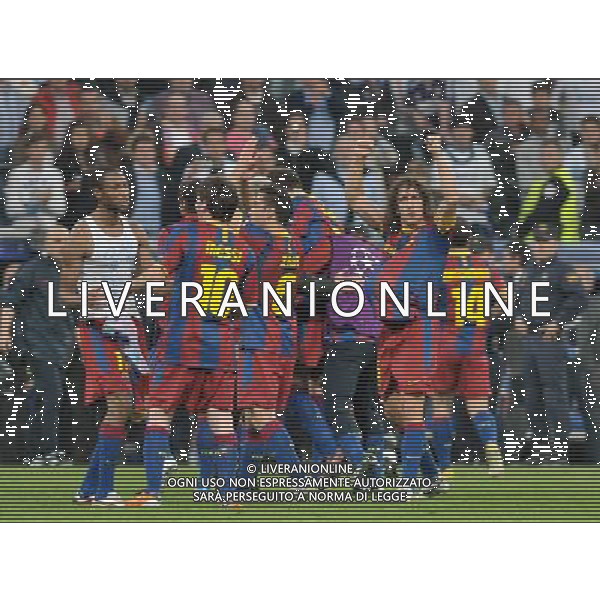 (110428) -- MADRID, April 28, 2011 () -- Players of Barcelona celebrate after the first leg match of Champions League semi-final against Real Madrid at Santiago Bernabeu Stadium in Madrid, Spain, April 27, 2011. Real Madrid lost 0-2. (/Chen Haitong) (bxf) AG ALDO LIVERANI ONLY ITALY