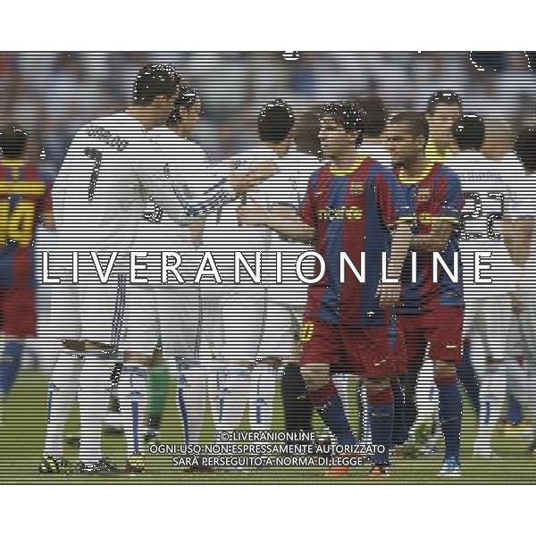 Real Madrid\'s Cristiano Ronaldo and Barcelona\'s Lionel Messi salute before Champions League match in Madrid. April 27, 2011. (ALTERPHOTOS/Alvaro Hernandez) AG ALDO LIVERANI ONLY ITALY