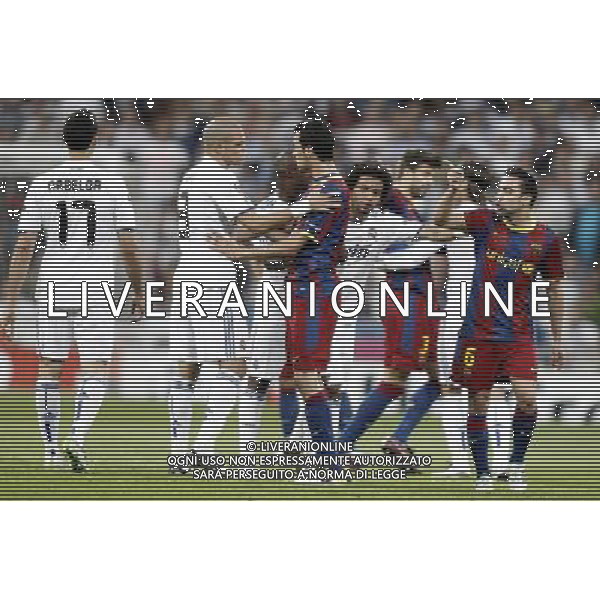 Real Madrid\'s Alvaro Arbeloa, Pepe and Marcelo argue with Barcelona\'s Sergio Busquets and Xavi Hernandez during Champions League match in Madrid. April 27, 2011. (ALTERPHOTOS/Alvaro Hernandez) AG ALDO LIVERANI ONLY ITALY