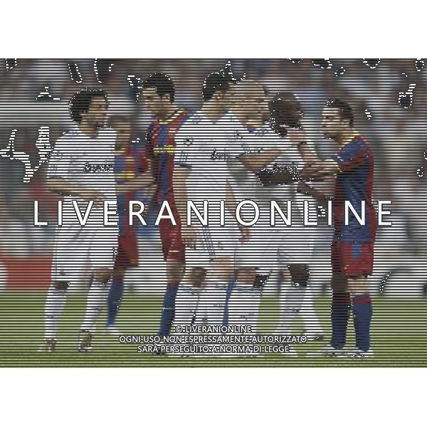 Real Madrid\'s Alvaro Arbeloa, Pepe and Marcelo argue with Barcelona\'s Sergio Busquets and Xavi Hernandez during Champions League match in Madrid. April 27, 2011. (ALTERPHOTOS/Alvaro Hernandez) AG ALDO LIVERANI ONLY ITALY