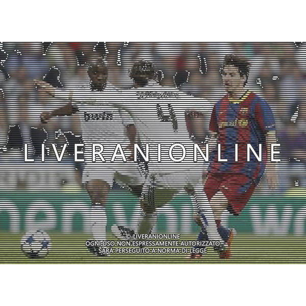 Real Madrid\'s Lass Diarra and Sergio Ramos against Barcelona\'s Lionel Messi during Champions League match in Madrid. April 27, 2011. (ALTERPHOTOS/Alvaro Hernandez) AG ALDO LIVERANI ONLY ITALY