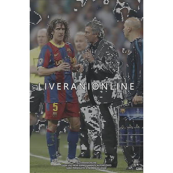 Real Madrid\'s coach Jose Mourinho argues with Barcelona\'s Carles Puyol during Champions League match in Madrid. April 27, 2011. (ALTERPHOTOS/Alvaro Hernandez) AG ALDO LIVERANI ONLY ITALY
