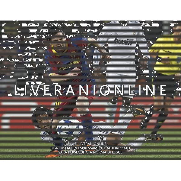 FC Barcelona\'s Leo Messi (f) and Real Madrid\'s Marcelo Vieira during UEFA Champions League match.May 3,2011.(ALTERPHOTOS/Acero) AG ALDO LIVERANI S A S ONLY ITALKY