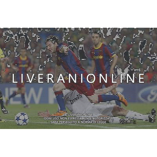 FC Barcelona\'s Leo Messi (l) and Real Madrid\'s Xabi Alonso during UEFA Champions League match.May 3,2011.Acer/ ALFAQUI AG ALDO LIVERANI S A S ONLY ITALKY