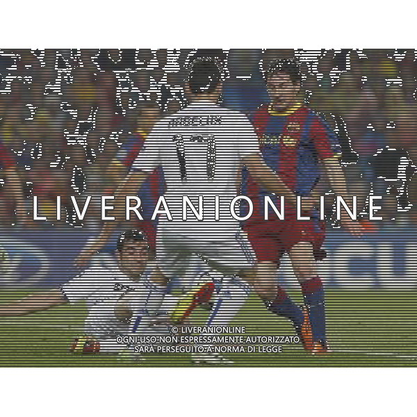 FC Barcelona\'s Leo Messi (r) and Real Madrid\'s Raul Albiol and Alvaro Arbeloa during UEFA Champions League match.May 3,2011.(ALTERPHOTOS/Acero) AG ALDO LIVERANI S A S ONLY ITALKY
