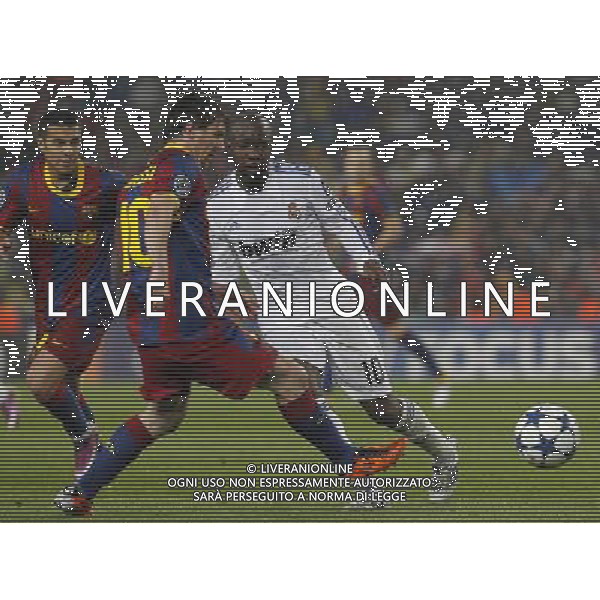 FC Barcelona\'s Leo Messi (l) and Real Madrid\'s Lass Diarra during UEFA Champions League match.May 3,2011.Steel / ALFAQUI AG ALDO LIVERANI S A S ONLY ITALKY