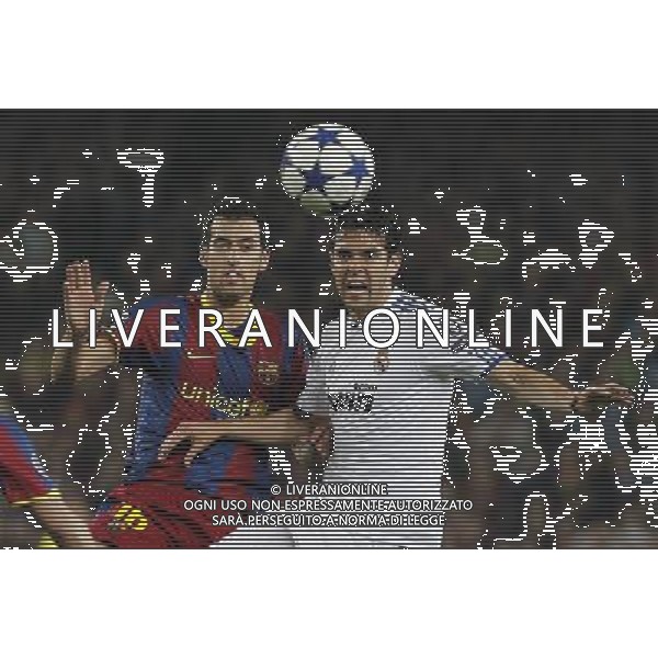 FC Barcelona\'s Sergio Busquets (l) and Real Madrid\'s Kaka during UEFA Champions League match.May 3,2011.Steel/ ALFAQUI AG ALDO LIVERANI S A S ONLY ITALKY