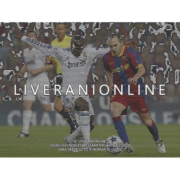 FC Barcelona\'s Andres Iniesta (r) and Real Madrid\'s Lass Diarra during UEFA Champions League match.May 3,2011.Steel/ ALFAQUI AG ALDO LIVERANI S A S ONLY ITALKY