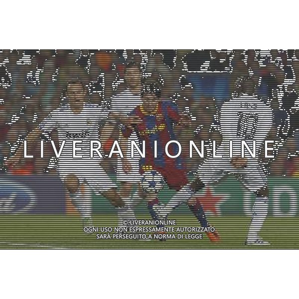 FC Barcelona\'s Leo Messi (c) and Real Madrid\'s Ricardo Carvalho, Xabi Alonso and Lass Diarra during UEFA Champions League match.May 3,2011.Steel/ ALFAQUI AG ALDO LIVERANI S A S ONLY ITALKY