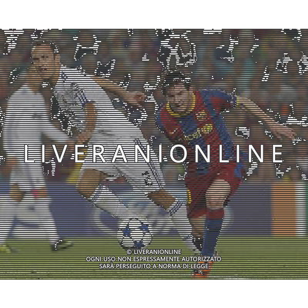 FC Barcelona\'s Leo Messi (r) and Real Madrid\'s Ricardo Carvalho during UEFA Champions League match.May 3,2011.Steel/ ALFAQUI AG ALDO LIVERANI S A S ONLY ITALKY
