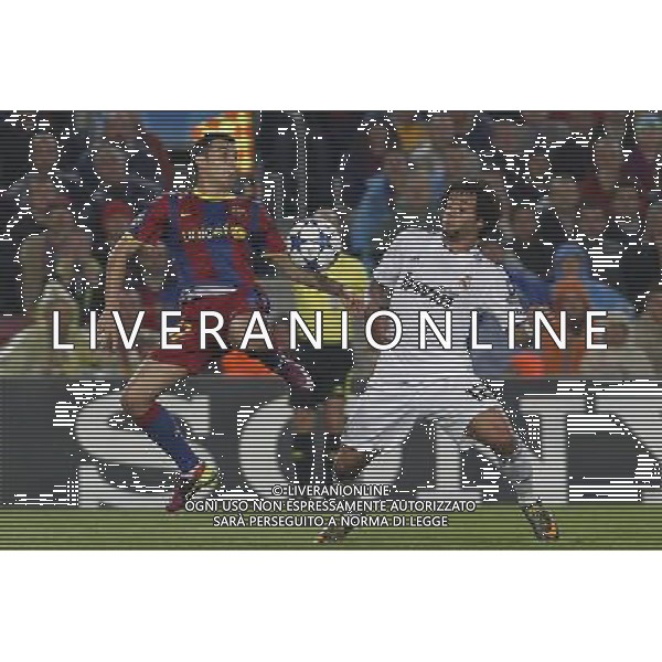 FC Barcelona\'s Pedro Rodriguez (l) and Real Madrid\'s Marcelo Vieira during UEFA Champions League match.May 3,2011.Steel/ ALFAQUI AG ALDO LIVERANI S A S ONLY ITALKY