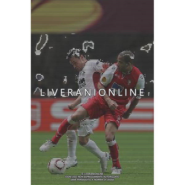 20110505: BRAGA, PORTUGAL - SC Braga vs SL Benfica: UEFA Europa League 2010/2011, Semi-Finals, Second Leg. In picture: Javier Saviola and Alberto Rodriguez. PHOTO: Pedro Benavente/CITYFILES /ALDO LIVERANI SPORT CALCIO EUROPA LEAGUE - SPORTING BRAGA - BENFICA - ITALY ONLY - *** Local Caption *** .