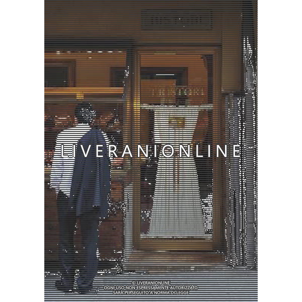 FLORENCE, May 6, 2011 A tourist browses a shop on the Old Bridge, or Ponte Vecchio, in Florence, central Italy, May 4, 2011. Florence is the capital city of the Italian region of Tuscany and the symbol of the Renaissance. UNESCO inscribed the historic center of Florence in the World Heritage List in 1982. (/Wang Qingqin) (lyx) VEDUTE DELLA CITTA DI FIRENZE AG ALDO LIVERANI ONLY ITALY