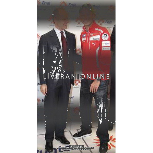 10/5/2011 MILANO VIA BROLETTO 46 ENEL: VALENTINO ROSSI PRESENTA IL NUOVO FLAGSHIP STORE DELL\'ENERGIA NELLA FOTO PAOLO ANDREA COLOMBO PRESIDENTE ENEL - VALENTINO ROSSI PH.FIOCHI/ALDO LIVERANI SAS