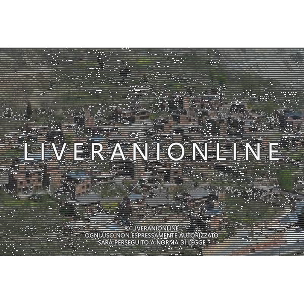 CHENGDU, May 10, 2011 The bird view photo taken on April 24, 2011 shows part of the residential area of Qiang ethnic group in Maoxian County, southwest China\'s Sichuan Province. Mu Hong, vice director of China\'s National Development and Reform Commission, on Tuesday said 95 percent of the post quake reconstruction projects have been completed so far in the areas hit by a devastating earthquake three years ago. According to the country\'s general reconstruction plan, the rebuilding in the quake zones is expected to be fully completed by the end of September, Mu Hong said. The devastating quake centered in Wenchuan County in southwestern Sichuan on May 12, 2008 left 87,000 people dead or missing and millions homeless. (/Chen Xie) (zhs) CHENGDU, 10 maggio 2011 La fotografia vista uccello preso il 24 Aprile 2011 mostra Erwang Tempio che  in fase di ricostruzione a Dujiangyan City nel sud-ovest della Cina nella provincia del Sichuan. AG. ALDO LIVERANI SAS ITALY ONLY *** Local Caption *** .