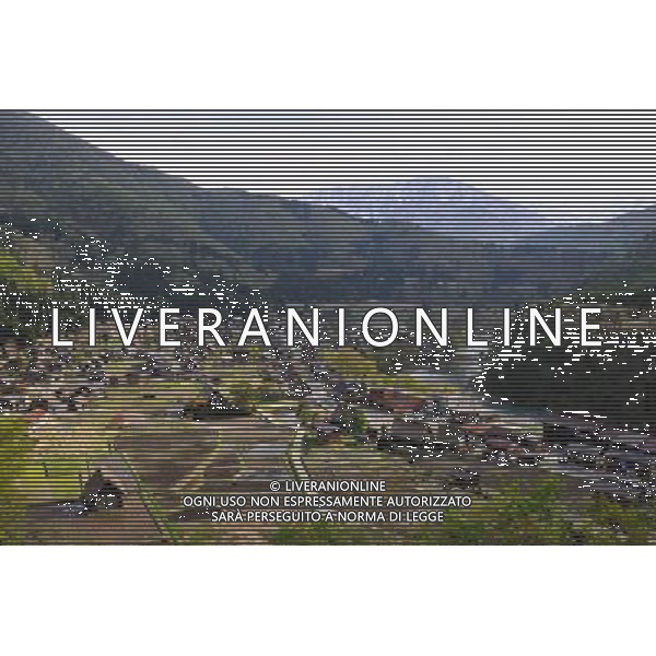 GIFU, May 10, 2011 This photo taken on May 9, 2011 shows the panorama of a gassho zukuri village in Shirakawa go, Gifu Prefecture, Japan. Gassho zukuri village in Shirakawa go is one of Japan\'s UNESCO World Heritage Sites. The village is well known for its houses constructed in architectural style known as gassho zukuri, which means prayer hands construction. This style is characterized by a thatched and steeply slanting roof resembling two hands joined in prayer. The design is strong and, in combination with the unique properties of the thatching, allow the houses to withstand and shed the weight of the region\'s heavy snowfalls in winter.(/Ji Chunpeng) (msq) Gifu le case di un villaggio gassho zukuri in Shirakawa , Prefettura di Gifu, in Giappone. Villaggio Gassho zukuri in Shirakawa Go  stato dichiarato dall\'UNESCO Patrimonio dell\'Umanitˆ AG.ALDO LIVERANI SAS ITALY ONLY *** Local Caption *** .