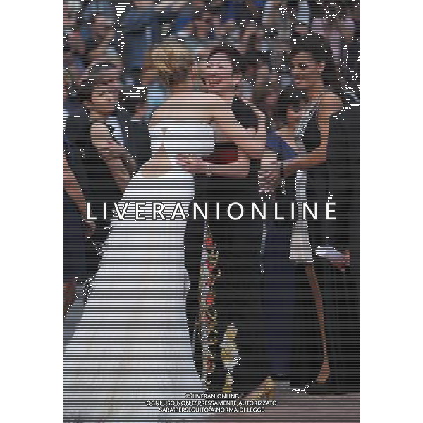 (110511) -- CANNES, May 11, 2011 () -- Jury members Uma Thurman (L) hugs Nansun Shi as they arrive for the opening of the 64th Cannes Film Festival in Cannes, France, on May 11, 2011. (/Gao Jing) 64mo Festival Internazionale del Cinema , Cannes AG. ALDO LIVERANI SAS ITALY ONLY *** Local Caption *** .