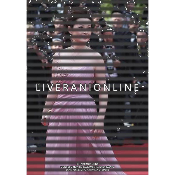 (110511) -- CANNES, May 11, 2011 () -- Chinese actress Yuan Li poses on the red carpet before the opening of the 64th Cannes Film Festival in Cannes, France, on May 11, 2011. (/Gao Jing) 64mo Festival Internazionale del Cinema a Cannes AG. ALDO LIVERANI SAS ITALY ONLY *** Local Caption *** .