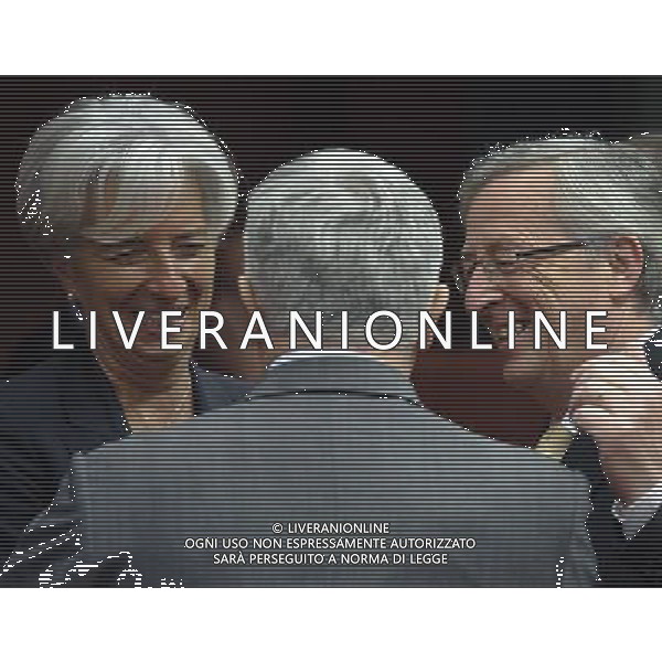 Luxembourg Prime Minister and president of the Eurogroup Council Jean-Claude Juncker (R), speaks with French Finance Minister Christine Lagarde and Italian Finance Minister Giulio Tremonti (C) prior to a ministerial meeting on the European Stability Mechanis and Eurogroup meeting in Brussels, Belgium on 2011-05-16 EU finance ministers met to discuss the financial aid package for Portugal and Greek debt crisis. Ministri delle finanze dell\'Unione europea si sono incontrati per discutere il pacchetto di aiuti finanziari per il Portogallo e della crisi del debito della Grecia AG. ALDO LIVERANI SAS ITALY ONLY *** Local Caption *** .