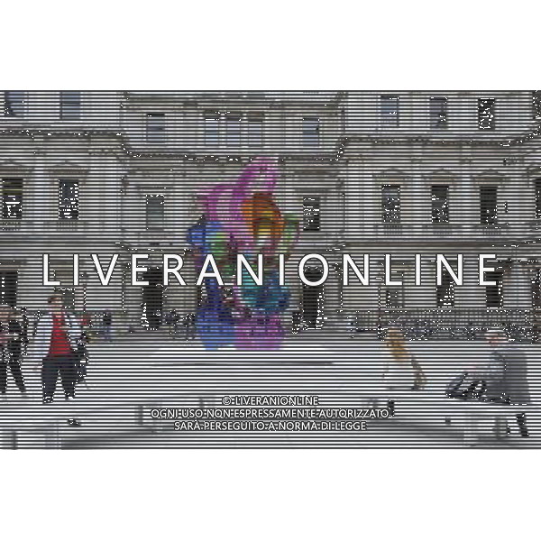 Jeff Koon\'s sculpture \'Colouring Book\' occupies the Royal Academy\'s Annenberg Courtyard in London. The coloufull piece reflects Koons interest in society\'s obsession with infantilism and youth AG. ALDO LIVERANI SAS ITALY ONLY *** Local Caption *** .