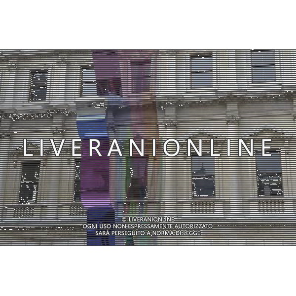 Jeff Koon\'s sculpture \'Colouring Book\' occupies the Royal Academy\'s Annenberg Courtyard in London. The coloufull piece reflects Koons interest in society\'s obsession with infantilism and youth AG. ALDO LIVERANI SAS ITALY ONLY *** Local Caption *** .