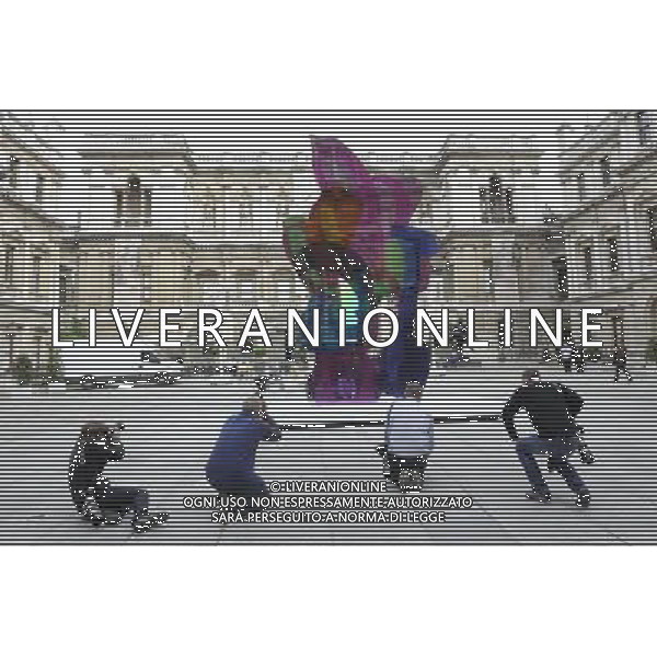 Jeff Koon\'s sculpture \'Colouring Book\' occupies the Royal Academy\'s Annenberg Courtyard in London. The coloufull piece reflects Koons interest in society\'s obsession with infantilism and youth AG. ALDO LIVERANI SAS ITALY ONLY *** Local Caption *** .