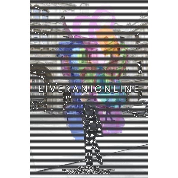 Jeff Koon\'s sculpture \'Colouring Book\' occupies the Royal Academy\'s Annenberg Courtyard in London. The coloufull piece reflects Koons interest in society\'s obsession with infantilism and youth AG. ALDO LIVERANI SAS ITALY ONLY *** Local Caption *** .