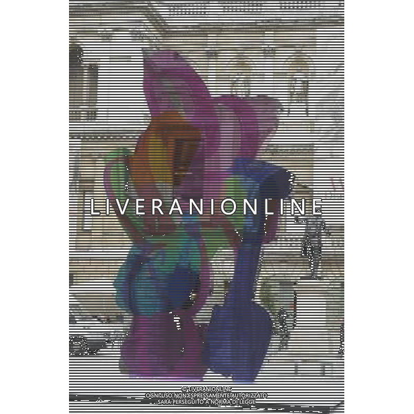 Jeff Koon\'s sculpture \'Colouring Book\' occupies the Royal Academy\'s Annenberg Courtyard in London. The coloufull piece reflects Koons interest in society\'s obsession with infantilism and youth AG. ALDO LIVERANI SAS ITALY ONLY *** Local Caption *** .