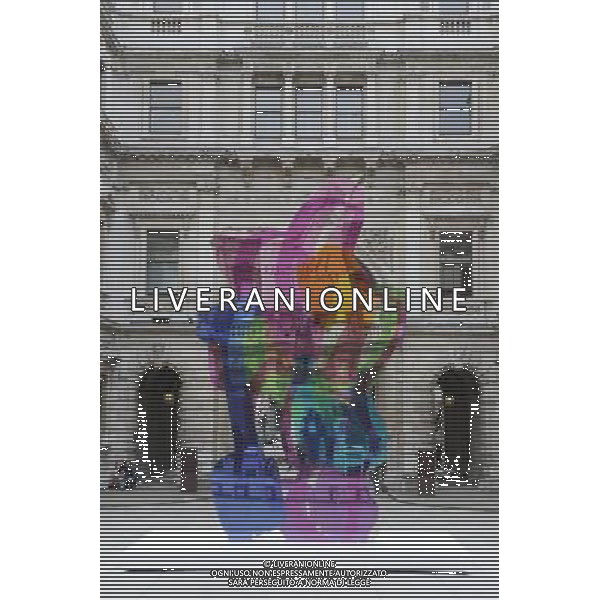 Jeff Koon\'s sculpture \'Colouring Book\' occupies the Royal Academy\'s Annenberg Courtyard in London. The coloufull piece reflects Koons interest in society\'s obsession with infantilism and youth AG. ALDO LIVERANI SAS ITALY ONLY *** Local Caption *** .