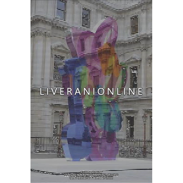 Jeff Koon\'s sculpture \'Colouring Book\' occupies the Royal Academy\'s Annenberg Courtyard in London. The coloufull piece reflects Koons interest in society\'s obsession with infantilism and youth AG. ALDO LIVERANI SAS ITALY ONLY *** Local Caption *** .