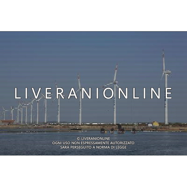 RONGCHENG, May 17, 2011 Photo taken on May 17, 2011 shows windmill power generators in Rongcheng City, east China\'s Shandong Province, May 16, 2011. The coastal Rongcheng City has attracted such large energy companies as Huaneng Group to invest wind power projects with the operational and under construction installed capacity totaling 25,000 kW and accumulative electricity generation of 600 million kWh. (/Guo Xulei) (lfj) Rongcheng , generatori di mulini a vento nella regione dello Rongcheng AG. ALDO LIVERANI SAS ITALY ONLY *** Local Caption *** .