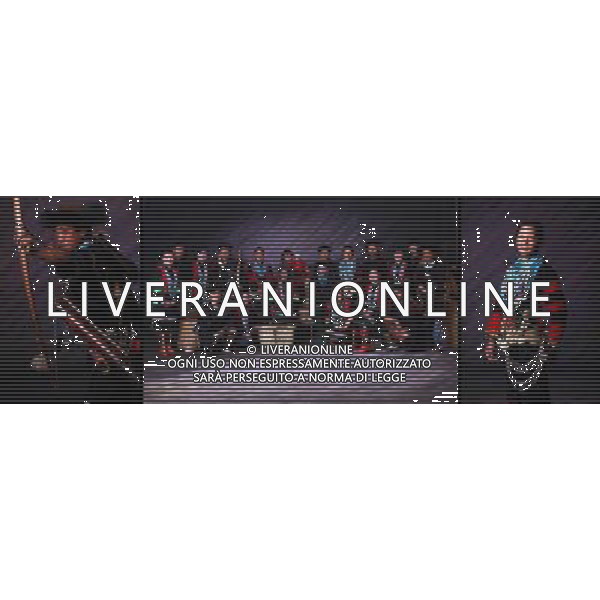 (110517) -- BEIJING, May 17, 2011 () -- This file combo photo shows the traditional costumes of Lhoba ethnic group. Located at the foot of snow-peaked mountains near the south border between China and India, the Nanyi Township of Qionglin Village, a tranquil and picturesque place, is inhabited by people of Lhoba ethnic group. With a total of 2900 people, Lhoba ethnic group is the smallest among China\'s 56 ethnic groups in term of population. The family of forty-six-year-old Ma Ya is one of the 30 Lhoba households in the village. They live in a two-storeyed house with many modern devices like television, washing machine, refrigerator, etc. In 2008, his family opened a household inn when Qionglin Village set up a scenic area. Their family inn soon went popular among tourists, and earned them about 6,000 yuan (922 U. S. dollars) per month at the tourism peak season from June to October. Yet just 50 years ago, before Ma Ya\'s birth, his father and grandfather still lived in the wood, depending mainly on hunting with bows and arrows, in the very form of a primitive society. As few knew their existence in the wildest nature, they were dubbed as \'the tribe of mystery\'. In the 1960s, after the peaceful liberation of Tibet, Ma Ya\'s father and some other Lhoba people moved out of the wood and settled on a land offered by the local government. By 1985, all the Lhoba people of the village have moved into free dwelling houses and started to breed livestock provided by the government, thus marking the brand-new start of their modern life. Instead of hunting and logging, their previous livelihood, local villagers of Lhoba now earn their living on stockbreeding, bamboo weaving, herbal medicine picking, and tourism. Under the benefits of many national policies preferential for minority groups, the annual income per capita of Nanyi Township reached 5760 yuan (885 U.S. dollars) in 2010. \'Before we moved here, most of the families even couldn\'t afford a pair of shoes.\' sa Situato ai piedi delle montagne innevate, vicino al confine meridionale tra la Cina e l\'India, il Comune di Nanyi Qionglin Village, un luogo pittoresco e tranquillo, abitato da persone del gruppo etnico Lhoba. Con un totale di 2900 persone, il gruppo etnico Lhoba  il pi piccolo dei 56 gruppi etnici in termini di popolazione in Cina Etnie - Vita - Rurali - AG. ALDO LIVERANI SAS ITALY ONLY *** Local Caption *** .