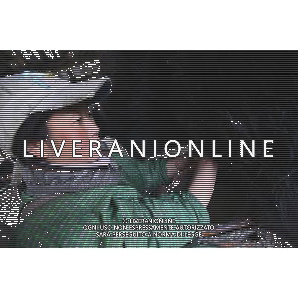 (110517) -- BEIJING, May 17, 2011 () -- Villager You Jiang of Lhoba ethnic group milks a cow at her farm in Qionglin Village of Nanyi Lhoba Ethnic Township, in Mainling County of southwest China\'s Tibet Autonomous Region (TAR), May 12, 2011. Located at the foot of snow-peaked mountains near the south border between China and India, the Nanyi Township of Qionglin Village, a tranquil and picturesque place, is inhabited by people of Lhoba ethnic group. With a total of 2900 people, Lhoba ethnic group is the smallest among China\'s 56 ethnic groups in term of population. The family of forty-six-year-old Ma Ya is one of the 30 Lhoba households in the village. They live in a two-storeyed house with many modern devices like television, washing machine, refrigerator, etc. In 2008, his family opened a household inn when Qionglin Village set up a scenic area. Their family inn soon went popular among tourists, and earned them about 6,000 yuan (922 U. S. dollars) per month at the tourism peak season from June to October. Yet just 50 years ago, before Ma Ya\'s birth, his father and grandfather still lived in the wood, depending mainly on hunting with bows and arrows, in the very form of a primitive society. As few knew their existence in the wildest nature, they were dubbed as \'the tribe of mystery\'. In the 1960s, after the peaceful liberation of Tibet, Ma Ya\'s father and some other Lhoba people moved out of the wood and settled on a land offered by the local government. By 1985, all the Lhoba people of the village have moved into free dwelling houses and started to breed livestock provided by the government, thus marking the brand-new start of their modern life. Instead of hunting and logging, their previous livelihood, local villagers of Lhoba now earn their living on stockbreeding, bamboo weaving, herbal medicine picking, and tourism. Under the benefits of many national policies preferential for minority groups, the annual income per capita of Nanyi Township rea Situato ai piedi delle montagne innevate, vicino al confine meridionale tra la Cina e l\'India, il Comune di Nanyi Qionglin Village, un luogo pittoresco e tranquillo, abitato da persone del gruppo etnico Lhoba. Con un totale di 2900 persone, il gruppo etnico Lhoba  il pi piccolo dei 56 gruppi etnici in termini di popolazione in Cina Etnie - Vita - Rurali - AG. ALDO LIVERANI SAS ITALY ONLY *** Local Caption *** .