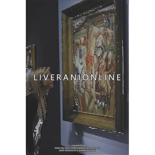 Christies unveil a £14million sale of 20th Century British and Irish Artwhich includes work by L.S. Lowry, Samuel John Peploe and the first painting by Winston Churchill to to painted by him after the end of World War II. Picture shows: The Crucifixion (1934) by Sir Stanley Spencer R.A esimated at £1m- £1.5m. ©PHOTOSHOT/Agenzia Aldo Liverani Sas - ITALY ONLY - Londra: La casa d\'aste Christies mostra i dipinti che saranno all\'asta tra cui il primo dipinto di Winston Churchill e quelli che dipinse dopo la fine della seconda guerra mondiale.