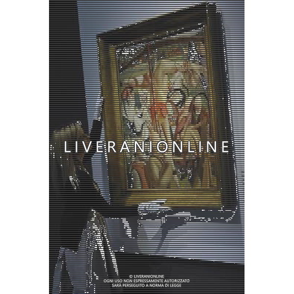 Christies unveil a £14million sale of 20th Century British and Irish Artwhich includes work by L.S. Lowry, Samuel John Peploe and the first painting by Winston Churchill to to painted by him after the end of World War II. Picture shows: The Crucifixion (1934) by Sir Stanley Spencer R.A esimated at £1m- £1.5m. ©PHOTOSHOT/Agenzia Aldo Liverani Sas - ITALY ONLY - Londra: La casa d\'aste Christies mostra i dipinti che saranno all\'asta tra cui il primo dipinto di Winston Churchill e quelli che dipinse dopo la fine della seconda guerra mondiale.