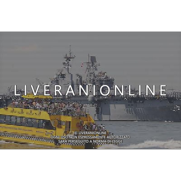 (110525) -- NEW YORK, May 25, 2011 () -- USS Iwo Jima (Rear) sails on the Hudson River during the \'Parade of Ships\' in New York, the United States, May 25, 2011. The 24th annual New York Fleet Week kicked off on the Hudson River Wednesday morning. (/Shen Hong) (wjd) Navi da guerra americane nella consueta \'Parade of Ships\' a New York per la 24ma annuale New York Fleet Week AG. ALDO LIVERANI SAS ITALY ONLY *** Local Caption *** .