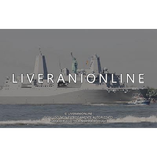 (110525) -- NEW YORK, May 25, 2011 () -- USS New York passes the Statue of Liberty during the \'Parade of Ships\' in New York, the United States, May 25, 2011. The 24th annual New York Fleet Week kicked off on the Hudson River Wednesday morning. (/Shen Hong) (wjd) Navi da guerra americane nella consueta \'Parade of Ships\' a New York per la 24ma annuale New York Fleet Week AG. ALDO LIVERANI SAS ITALY ONLY *** Local Caption *** .