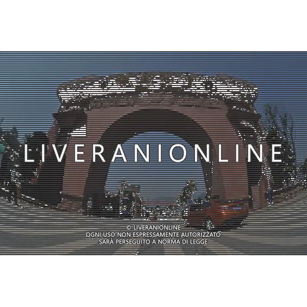 RENHUAI, May 26, 2011 Photo taken on May 19, 2011 shows the new gate of Moutai Co. Ltd. in Maotai Township of Renhuai, southwest China\'s Guizhou Province. Maotai is a small town in Renhuai City of Zunyi, southwest China\'s Guizhou Province. Liquor making can be dated back to 2,000 years ago in the small town. There are many anecdotes about the liquor. During the Long March, the Chinese Red Army passed through Maotai Town in 1935, and used the hard liquor to treat the wounds of soldiers. In January 1935, an enlarged meeting of the Political Bureau of the Communist Party of China (CPC) Central Committee was held in Zunyi, the place where Mao Zedong established his authority within the military, marking a turning point for the CPC and paving the way for the success of China\'s revolution. With deep affection to the liquor, Chinese leaders honored Moutai as the national liquor after the founding of the People\'s Republic of China. Moutai liquor was officially used to feast foreign heads of state and distinguished guests visiting China, and was the only alcohol given as official gifts by Chinese embassies in foreign countries. It is said that former U.S. President Richard Nixon was fascinated by Moutai liquor when he visited China in 1972. As China moves from a planned to a market economy, the Moutai brewery has developed into one of China\'s handful of leading liquor producers with conspicuous achievements in modern corporate management and construction of factory facilities. In 2010, the annual output of Moutai liquor topped 26,000 tons. However, the market supply and demand of the liquor is imbalanced because of its special manufacturing techniques. Prices of the liquor range from 1,000 RMB yuan (about 154 U.S. dollars) to more than 10,000 RMB yuan (about 1,541 U.S. dollars) per bottle. In April, a bottle of vintage Moutai was sold for 8.9 million RMB yuan (about 1.37 million U.S. dollars) at an auction in Guizhou, while the price of Moutai liquor was less than 1