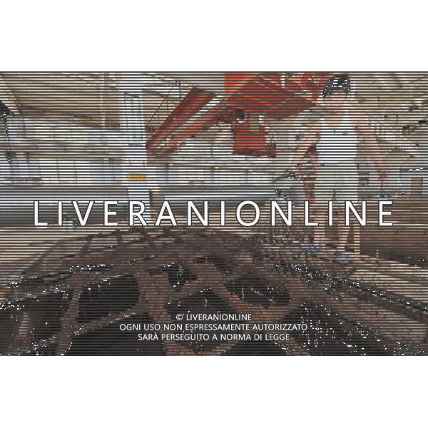 RENHUAI, May 26, 2011 A worker is seen at a plant of Moutai Co. Ltd. in Maotai Township of Renhuai, southwest China\'s Guizhou Province, May 17, 2011. Maotai is a small town in Renhuai City of Zunyi, southwest China\'s Guizhou Province. Liquor making can be dated back to 2,000 years ago in the small town. There are many anecdotes about the liquor. During the Long March, the Chinese Red Army passed through Maotai Town in 1935, and used the hard liquor to treat the wounds of soldiers. In January 1935, an enlarged meeting of the Political Bureau of the Communist Party of China (CPC) Central Committee was held in Zunyi, the place where Mao Zedong established his authority within the military, marking a turning point for the CPC and paving the way for the success of China\'s revolution. With deep affection to the liquor, Chinese leaders honored Moutai as the national liquor after the founding of the People\'s Republic of China. Moutai liquor was officially used to feast foreign heads of state and distinguished guests visiting China, and was the only alcohol given as official gifts by Chinese embassies in foreign countries. It is said that former U.S. President Richard Nixon was fascinated by Moutai liquor when he visited China in 1972. As China moves from a planned to a market economy, the Moutai brewery has developed into one of China\'s handful of leading liquor producers with conspicuous achievements in modern corporate management and construction of factory facilities. In 2010, the annual output of Moutai liquor topped 26,000 tons. However, the market supply and demand of the liquor is imbalanced because of its special manufacturing techniques. Prices of the liquor range from 1,000 RMB yuan (about 154 U.S. dollars) to more than 10,000 RMB yuan (about 1,541 U.S. dollars) per bottle. In April, a bottle of vintage Moutai was sold for 8.9 million RMB yuan (about 1.37 million U.S. dollars) at an auction in Guizhou, while the price of Moutai liquor was less than 10 RMB