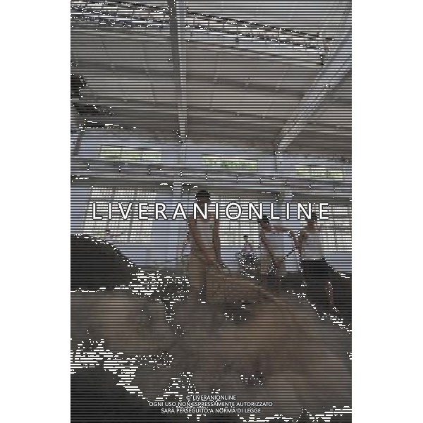 RENHUAI, May 26, 2011 Workers pour ferment materials at a plant of Moutai Co. Ltd. in Maotai Township of Renhuai, southwest China\'s Guizhou Province, May 17, 2011. Maotai is a small town in Renhuai City of Zunyi, southwest China\'s Guizhou Province. Liquor making can be dated back to 2,000 years ago in the small town. There are many anecdotes about the liquor. During the Long March, the Chinese Red Army passed through Maotai Town in 1935, and used the hard liquor to treat the wounds of soldiers. In January 1935, an enlarged meeting of the Political Bureau of the Communist Party of China (CPC) Central Committee was held in Zunyi, the place where Mao Zedong established his authority within the military, marking a turning point for the CPC and paving the way for the success of China\'s revolution. With deep affection to the liquor, Chinese leaders honored Moutai as the national liquor after the founding of the People\'s Republic of China. Moutai liquor was officially used to feast foreign heads of state and distinguished guests visiting China, and was the only alcohol given as official gifts by Chinese embassies in foreign countries. It is said that former U.S. President Richard Nixon was fascinated by Moutai liquor when he visited China in 1972. As China moves from a planned to a market economy, the Moutai brewery has developed into one of China\'s handful of leading liquor producers with conspicuous achievements in modern corporate management and construction of factory facilities. In 2010, the annual output of Moutai liquor topped 26,000 tons. However, the market supply and demand of the liquor is imbalanced because of its special manufacturing techniques. Prices of the liquor range from 1,000 RMB yuan (about 154 U.S. dollars) to more than 10,000 RMB yuan (about 1,541 U.S. dollars) per bottle. In April, a bottle of vintage Moutai was sold for 8.9 million RMB yuan (about 1.37 million U.S. dollars) at an auction in Guizhou, while the price of Moutai liquor was le