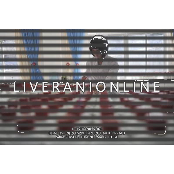 RENHUAI, May 26, 2011 A worker classifies liquor at a plant of Moutai Co. Ltd. in Maotai Township of Renhuai, southwest China\'s Guizhou Province, May 18, 2011. Maotai is a small town in Renhuai City of Zunyi, southwest China\'s Guizhou Province. Liquor making can be dated back to 2,000 years ago in the small town. There are many anecdotes about the liquor. During the Long March, the Chinese Red Army passed through Maotai Town in 1935, and used the hard liquor to treat the wounds of soldiers. In January 1935, an enlarged meeting of the Political Bureau of the Communist Party of China (CPC) Central Committee was held in Zunyi, the place where Mao Zedong established his authority within the military, marking a turning point for the CPC and paving the way for the success of China\'s revolution. With deep affection to the liquor, Chinese leaders honored Moutai as the national liquor after the founding of the People\'s Republic of China. Moutai liquor was officially used to feast foreign heads of state and distinguished guests visiting China, and was the only alcohol given as official gifts by Chinese embassies in foreign countries. It is said that former U.S. President Richard Nixon was fascinated by Moutai liquor when he visited China in 1972. As China moves from a planned to a market economy, the Moutai brewery has developed into one of China\'s handful of leading liquor producers with conspicuous achievements in modern corporate management and construction of factory facilities. In 2010, the annual output of Moutai liquor topped 26,000 tons. However, the market supply and demand of the liquor is imbalanced because of its special manufacturing techniques. Prices of the liquor range from 1,000 RMB yuan (about 154 U.S. dollars) to more than 10,000 RMB yuan (about 1,541 U.S. dollars) per bottle. In April, a bottle of vintage Moutai was sold for 8.9 million RMB yuan (about 1.37 million U.S. dollars) at an auction in Guizhou, while the price of Moutai liquor was less t