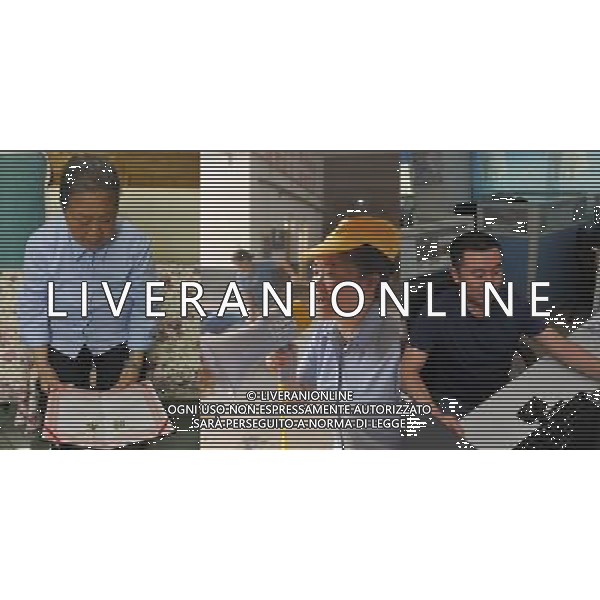 RENHUAI, May 26, 2011 The combined photo (all taken on May 18, 2011) shows the 76 year old retired worker of Moutai distillery Hu Shixian (L), her daughter Wang Xirong (C), a plant manger of the distillery, and her granddaughter\'s husband Chen Wei, a salesman of the distillery, in Maotai Township of Renhuai, southwest China\'s Guizhou Province. A total of 19 members of Hu\'s family have worked in the distillery. Maotai is a small town in Renhuai City of Zunyi, southwest China\'s Guizhou Province. Liquor making can be dated back to 2,000 years ago in the small town. There are many anecdotes about the liquor. During the Long March, the Chinese Red Army passed through Maotai Town in 1935, and used the hard liquor to treat the wounds of soldiers. In January 1935, an enlarged meeting of the Political Bureau of the Communist Party of China (CPC) Central Committee was held in Zunyi, the place where Mao Zedong established his authority within the military, marking a turning point for the CPC and paving the way for the success of China\'s revolution. With deep affection to the liquor, Chinese leaders honored Moutai as the national liquor after the founding of the People\'s Republic of China. Moutai liquor was officially used to feast foreign heads of state and distinguished guests visiting China, and was the only alcohol given as official gifts by Chinese embassies in foreign countries. It is said that former U.S. President Richard Nixon was fascinated by Moutai liquor when he visited China in 1972. As China moves from a planned to a market economy, the Moutai brewery has developed into one of China\'s handful of leading liquor producers with conspicuous achievements in modern corporate management and construction of factory facilities. In 2010, the annual output of Moutai liquor topped 26,000 tons. However, the market supply and demand of the liquor is imbalanced because of its special manufacturing techniques. Prices of the liquor range from 1,000 RMB yuan (about 154 U.