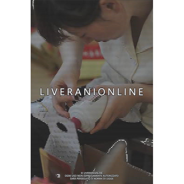 RENHUAI, May 26, 2011 A worker pastes anti false label on a bottle at a plant of Moutai Co. Ltd. in Maotai Township of Renhuai, southwest China\'s Guizhou Province, May 18, 2011. Maotai is a small town in Renhuai City of Zunyi, southwest China\'s Guizhou Province. Liquor making can be dated back to 2,000 years ago in the small town. There are many anecdotes about the liquor. During the Long March, the Chinese Red Army passed through Maotai Town in 1935, and used the hard liquor to treat the wounds of soldiers. In January 1935, an enlarged meeting of the Political Bureau of the Communist Party of China (CPC) Central Committee was held in Zunyi, the place where Mao Zedong established his authority within the military, marking a turning point for the CPC and paving the way for the success of China\'s revolution. With deep affection to the liquor, Chinese leaders honored Moutai as the national liquor after the founding of the People\'s Republic of China. Moutai liquor was officially used to feast foreign heads of state and distinguished guests visiting China, and was the only alcohol given as official gifts by Chinese embassies in foreign countries. It is said that former U.S. President Richard Nixon was fascinated by Moutai liquor when he visited China in 1972. As China moves from a planned to a market economy, the Moutai brewery has developed into one of China\'s handful of leading liquor producers with conspicuous achievements in modern corporate management and construction of factory facilities. In 2010, the annual output of Moutai liquor topped 26,000 tons. However, the market supply and demand of the liquor is imbalanced because of its special manufacturing techniques. Prices of the liquor range from 1,000 RMB yuan (about 154 U.S. dollars) to more than 10,000 RMB yuan (about 1,541 U.S. dollars) per bottle. In April, a bottle of vintage Moutai was sold for 8.9 million RMB yuan (about 1.37 million U.S. dollars) at an auction in Guizhou, while the price of Moutai