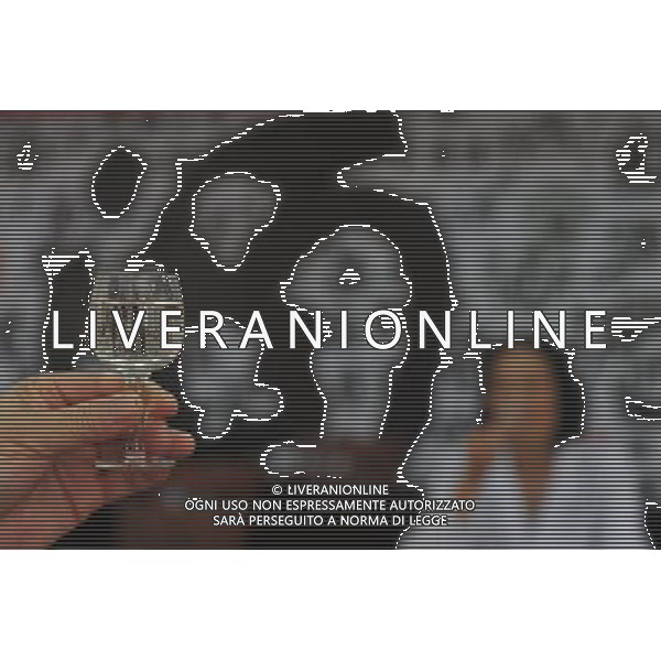 (110526) -- RENHUAI, May 26, 2011 () -- A worker judges liquor at Moutai Co. Ltd. in Maotai Township of Renhuai, southwest China\'s Guizhou Province, May 18, 2011. Maotai is a small town in Renhuai City of Zunyi, southwest China\'s Guizhou Province. Liquor-making can be dated back to 2,000 years ago in the small town. There are many anecdotes about the liquor. During the Long March, the Chinese Red Army passed through Maotai Town in 1935, and used the hard liquor to treat the wounds of soldiers. In January 1935, an enlarged meeting of the Political Bureau of the Communist Party of China (CPC) Central Committee was held in Zunyi, the place where Mao Zedong established his authority within the military, marking a turning point for the CPC and paving the way for the success of China\'s revolution. With deep affection to the liquor, Chinese leaders honored Moutai as the national liquor after the founding of the People\'s Republic of China. Moutai liquor was officially used to feast foreign heads of state and distinguished guests visiting China, and was the only alcohol given as official gifts by Chinese embassies in foreign countries. It is said that former U.S. President Richard Nixon was fascinated by Moutai liquor when he visited China in 1972. As China moves from a planned to a market economy, the Moutai brewery has developed into one of China\'s handful of leading liquor producers with conspicuous achievements in modern corporate management and construction of factory facilities. In 2010, the annual output of Moutai liquor topped 26,000 tons. However, the market supply and demand of the liquor is imbalanced because of its special manufacturing techniques. Prices of the liquor range from 1,000 RMB yuan (about 154 U.S. dollars) to more than 10,000 RMB yuan (about 1,541 U.S. dollars) per bottle. In April, a bottle of vintage Moutai was sold for 8.9 million RMB yuan (about 1.37 million U.S. dollars) at an auction in Guizhou, while the price of Moutai liquor was les