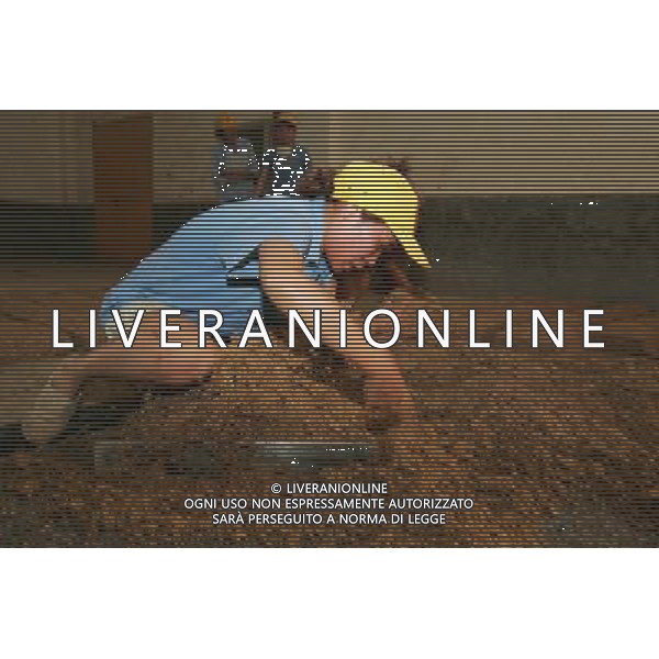 (110526) -- RENHUAI, May 26, 2011 () -- A worker makes \'jiuqu\', a kind of yeast made from wheat, at a plant of Moutai Co. Ltd. in Maotai Township of Renhuai, southwest China\'s Guizhou Province, May 19, 2011. Maotai is a small town in Renhuai City of Zunyi, southwest China\'s Guizhou Province. Liquor-making can be dated back to 2,000 years ago in the small town. There are many anecdotes about the liquor. During the Long March, the Chinese Red Army passed through Maotai Town in 1935, and used the hard liquor to treat the wounds of soldiers. In January 1935, an enlarged meeting of the Political Bureau of the Communist Party of China (CPC) Central Committee was held in Zunyi, the place where Mao Zedong established his authority within the military, marking a turning point for the CPC and paving the way for the success of China\'s revolution. With deep affection to the liquor, Chinese leaders honored Moutai as the national liquor after the founding of the People\'s Republic of China. Moutai liquor was officially used to feast foreign heads of state and distinguished guests visiting China, and was the only alcohol given as official gifts by Chinese embassies in foreign countries. It is said that former U.S. President Richard Nixon was fascinated by Moutai liquor when he visited China in 1972. As China moves from a planned to a market economy, the Moutai brewery has developed into one of China\'s handful of leading liquor producers with conspicuous achievements in modern corporate management and construction of factory facilities. In 2010, the annual output of Moutai liquor topped 26,000 tons. However, the market supply and demand of the liquor is imbalanced because of its special manufacturing techniques. Prices of the liquor range from 1,000 RMB yuan (about 154 U.S. dollars) to more than 10,000 RMB yuan (about 1,541 U.S. dollars) per bottle. In April, a bottle of vintage Moutai was sold for 8.9 million RMB yuan (about 1.37 million U.S. dollars) at an auction in Gu