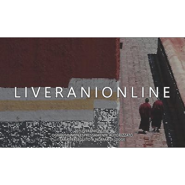 (110526) -- SAGYA, May 26, 2011 () -- Monks walk in Sagya Monastery in Sagya County, southwest China\'s Tibet Autonomous Region, May 19, 2011. Sagya Monastery, a monastery of Sagayapa sect of Tibetan Buddhism, is known for housing numerous classical books on Buddhism and precious paintings. It was built in 1073 on the gray clay hill on the northern bank of the Chun Qu River in Sagya County, 149 kilometers from Xigaze Prefecture, and designed in a combined architectural style of China\'s Tibetan, Mogolian and Han ethnic groups. The monastery has been repaired and renovated from June 2002 to August 2009, sponsored by the governmental fund of more than 90 million yuan (13.85 million USD). (/Tao Xiyi) (zn) Il Tempio Tibetano Buddista di Sagya nella regione autonoma del Tibet AG. ALDO LIVERANI SAS ITYALY ONLY *** Local Caption *** .