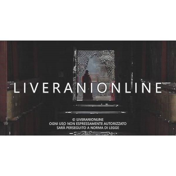 (110526) -- SAGYA, May 26, 2011 () -- A monk is seen beside a temple gate in Sagya Monastery in Sagya County, southwest China\'s Tibet Autonomous Region, May 19, 2011. Sagya Monastery, a monastery of Sagayapa sect of Tibetan Buddhism, is known for housing numerous classical books on Buddhism and precious paintings. It was built in 1073 on the gray clay hill on the northern bank of the Chun Qu River in Sagya County, 149 kilometers from Xigaze Prefecture, and designed in a combined architectural style of China\'s Tibetan, Mogolian and Han ethnic groups. The monastery has been repaired and renovated from June 2002 to August 2009, sponsored by the governmental fund of more than 90 million yuan (13.85 million USD). (/Tao Xiyi) (zn) Il Tempio Tibetano Buddista di Sagya nella regione autonoma del Tibet AG. ALDO LIVERANI SAS ITYALY ONLY *** Local Caption *** .